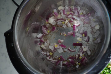 Tadka for dal, oil with cumin seeds and onions