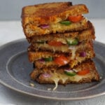 Spicy inside out grilled cheese Stacked grilled cheese with jalapenos, onions and tomatoes