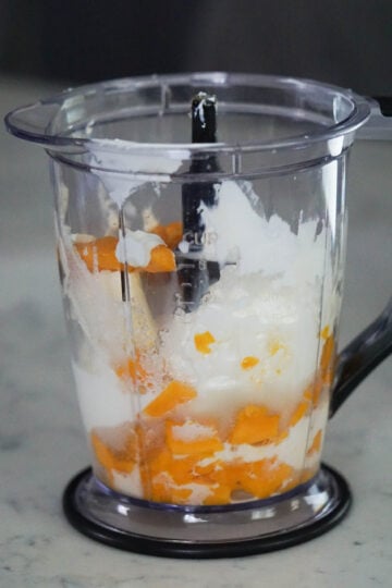 Mango popsicle ingredients in blender