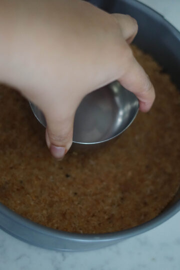 firmly press parle g crust into spring form pan