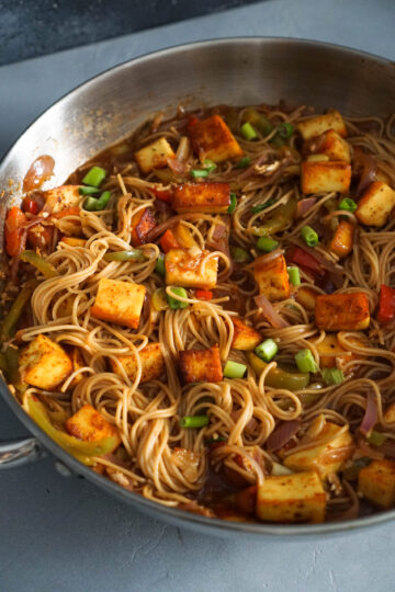 chilli paneer noodles in wok