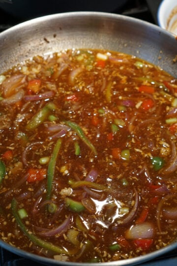 Paneer chilli gravy in a pan.
