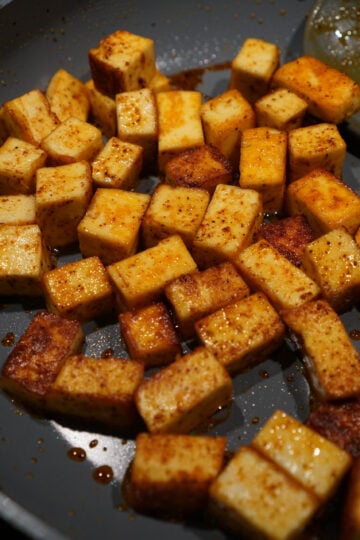 chilli paneer spiced in a pan