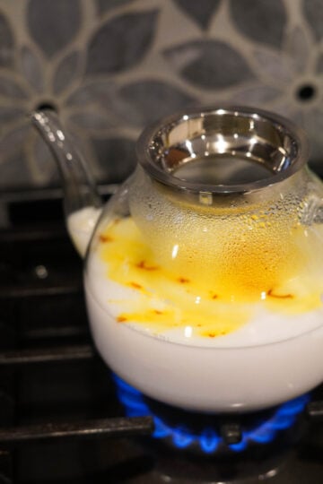 saffron milk boiling on stove