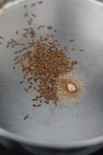 OIl with cumin seeds and asofetida
