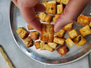 Flavored and browned paneer