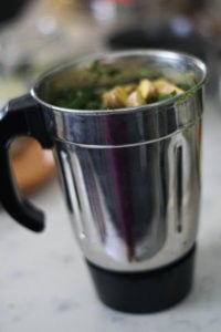 Cilantro chutney ingredients in a blender