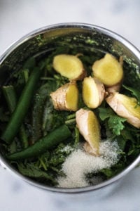 Mint pudina chutney ingredients in a blender