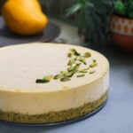 eggless mango shrikhand cheesecake with pistaschio garnish