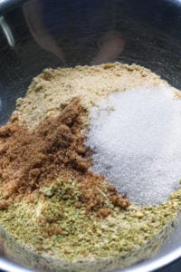 Pistachio cracker crust for cheesecake ingredients in a bowl