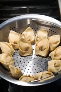 Paneer momos in a steamer