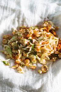 Paneer momo stuffing on a cheesecloth ready to be squeezed to drain water.