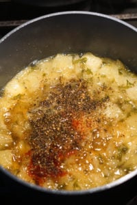 Spices added to pineapple chutney mixture.