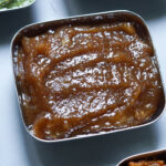 sweet dates chutney in a square steel bowl