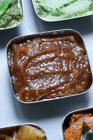 sweet dates chutney in a square steel bowl