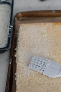 Rabdi milk soaked cake with a silicon gray brush.