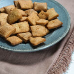 Shakarpara on a gray plate.
