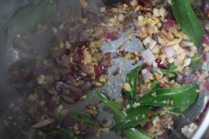 Ginger and curry leaves added to Instant Pot.