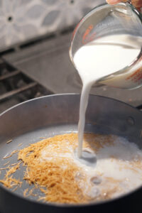 Milk added to roasted vermicelli.