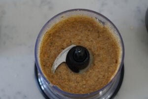 Blended chutney ingredients with water added.