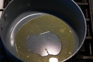 Melted ghee in a non-stick pan.