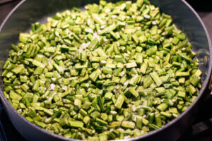 Chopped gawar in a pot with water and salt.