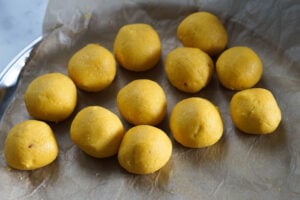 Peda balls on parchment paper.