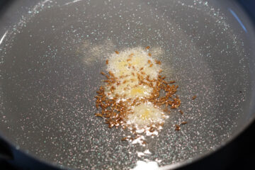 Tadka of cumin seeds and hing.