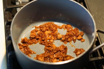 Jaggery added to pan with ghee.