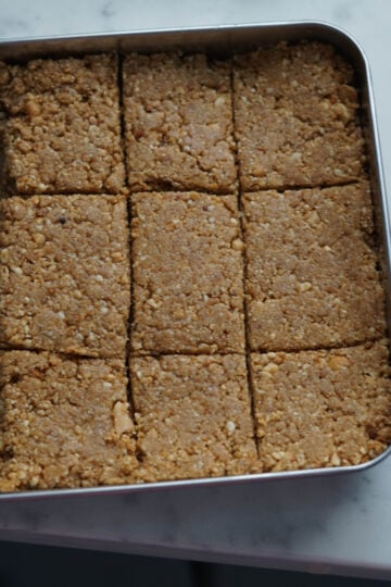 Cut pieces of sing pak in a pan.
