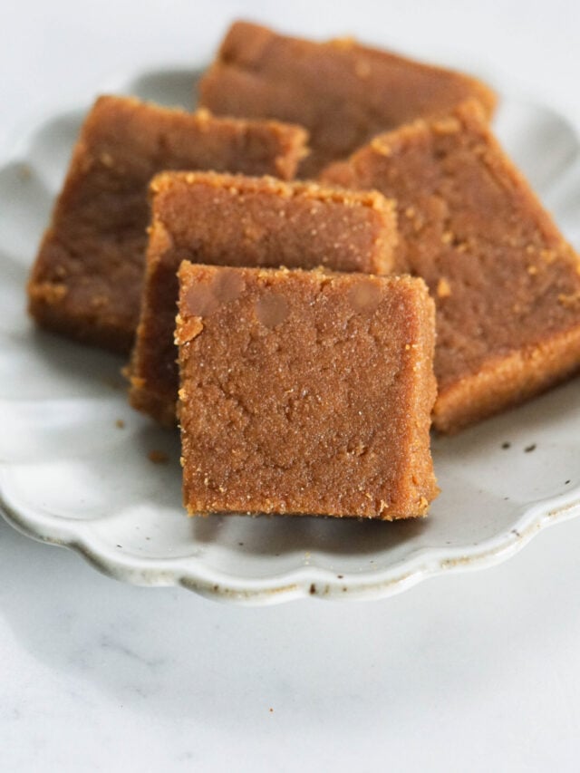 Sukhdi pieces on a white plate.
