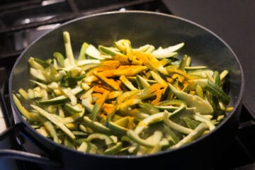 Turmeric powder added to parwal.
