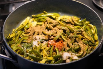 Indian spices added to pan.