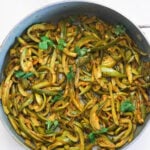 Parval sabzi pointed gourd Indian style in a pan.