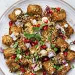 Tater tot chaat on a plate.