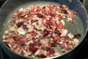 Onions added to pan.