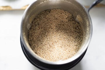 White poppy seeds added to spice grinder.