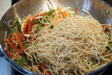 Noodles added to pan.