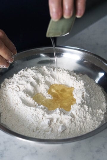 Wheat flour with oil in the center.