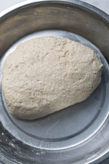Puran poli dough in a steel plate.