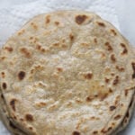 Puran poli stack on a napkin.