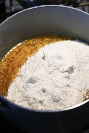 Milk powder added to mango mixture.