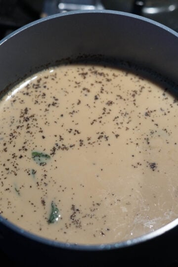 Milk added to pudina chai.
