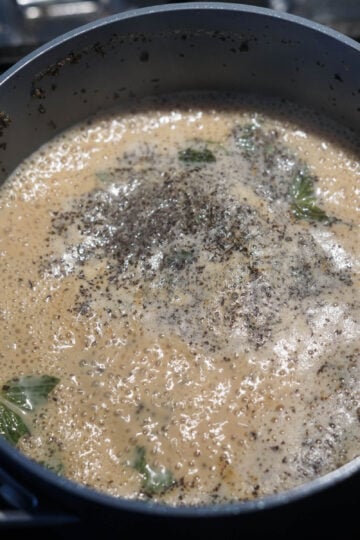 Milk mint tea simmering in a pot.