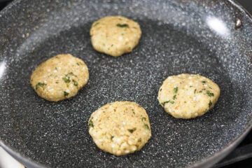 Sabudana cutlets in a pan.