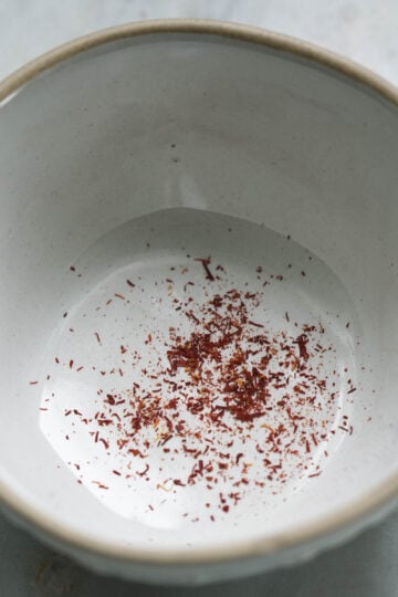 Finely ground saffron in a bowl.