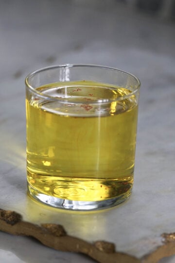 Glass of saffron water.