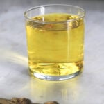 Glass of saffron water.