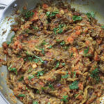 Oven roasted baingan bharta in a pan.