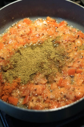 Masala added to mixture.